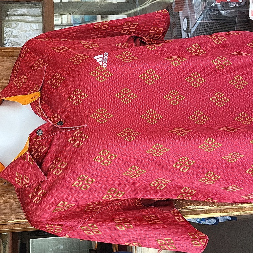 Adidas polo in muted REDS and oranges....great looking